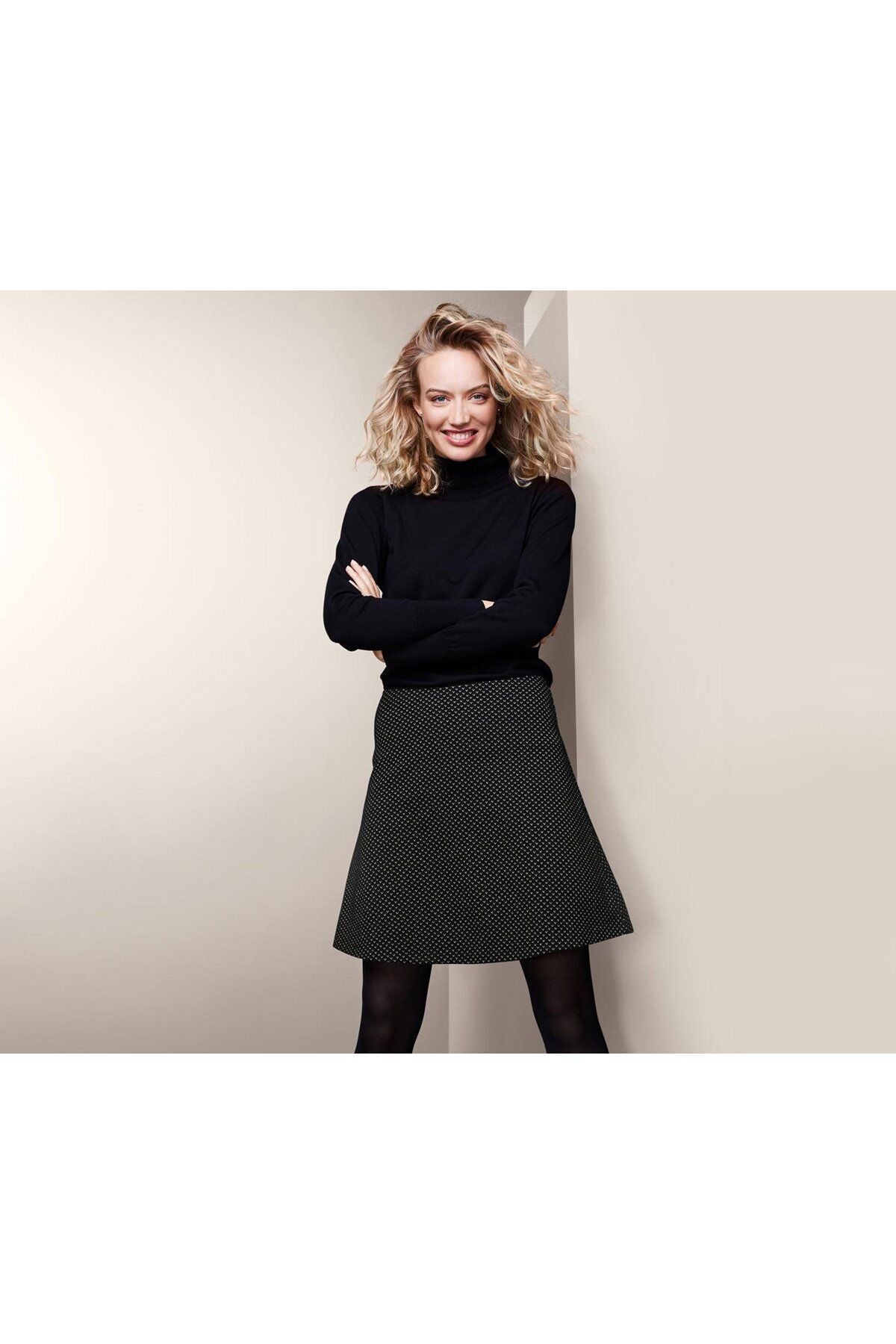 Black jersey flared skirt with glitter embroidery 