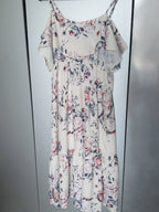 Women's summer dress with floral motifs