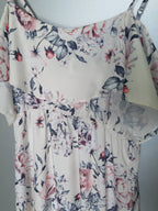 Women's summer dress with floral motifs