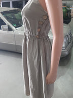 Women's linen dress with straps in sand color, collection 2025