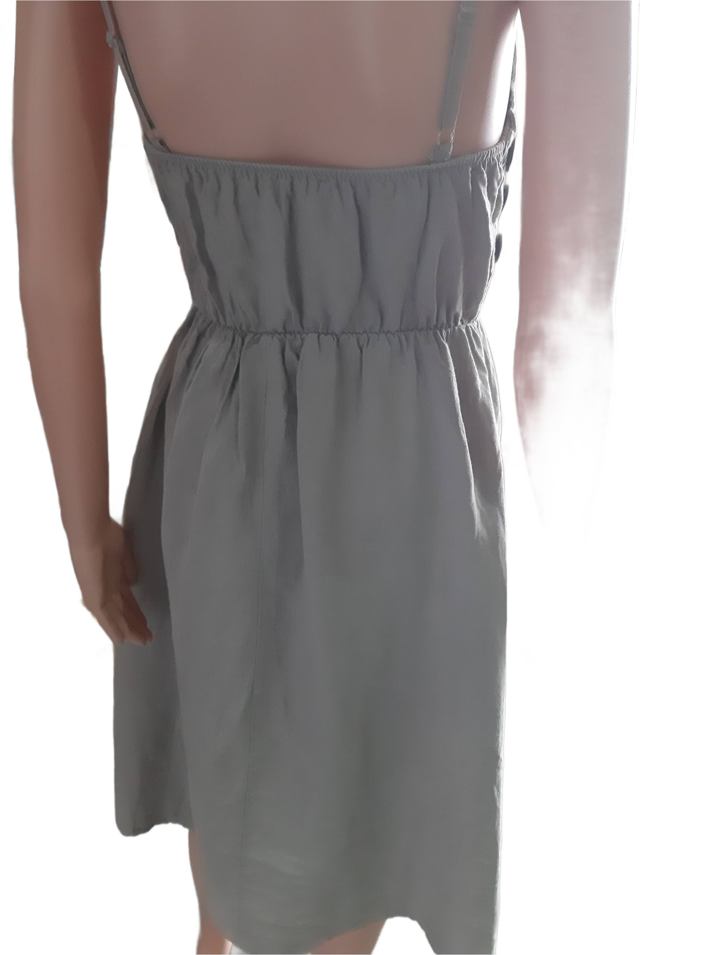 Women's linen dress with straps in sand color, collection 2025