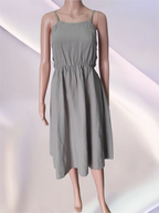 Women's linen dress with straps in sand color, collection 2025